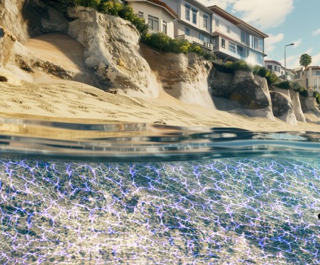 This illustration shows a grid of blue lines in the water along the coastline on which houses rest on the sandy cliffs above. The blue color illustrates the use of low-voltage electricity to turn sand into stone and protect the coast from erosion.